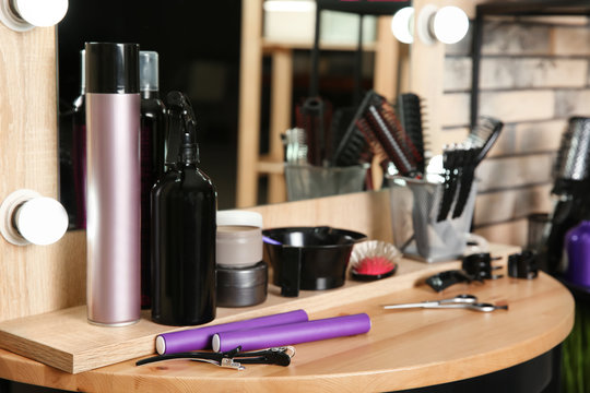 Professional hairdresser set on table in salon