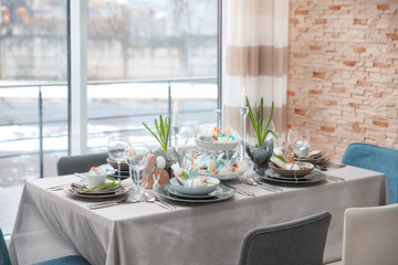 Beautiful Easter table setting with decorations