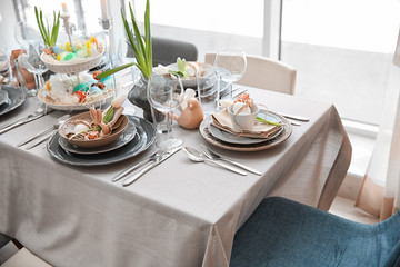 Beautiful Easter table setting with decorations