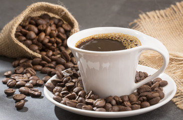 Coffee cup with coffee beans - Coffea