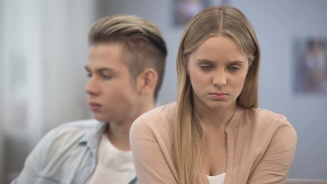 Teen woman is angry at boyfriend, feeling hurt, lack of love attention, break up