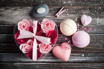 Bath accessories on rustic wooden table