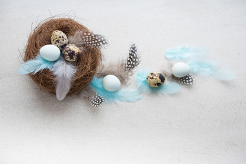 Easter eggs with flowers and feathers, greeting card