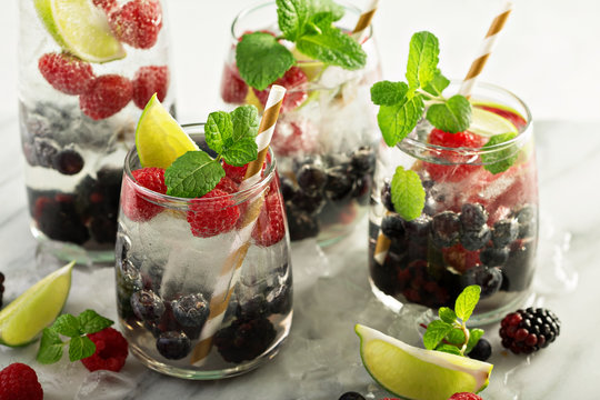 Coconut or infused water with fresh berries
