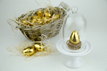 Chocolate easter eggs in gloden foil