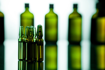 Group of ampoules with a transparent medicine in medical laboratory