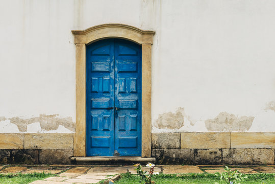 Blue vintage door at historic church in Ouro Preto, Brazil