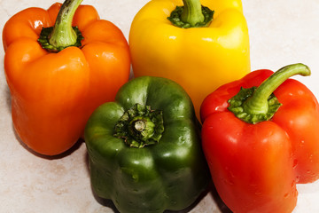 Four Bell Peppers Green Red Yellow Orange Together
