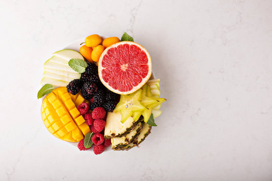 Fruit plate with mango, grapefruit and berries