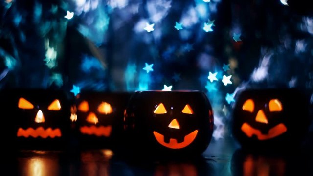 Halloween pumpkin with bokeh holiday lights