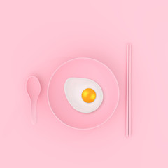 Fried egg on plate minimal concept
