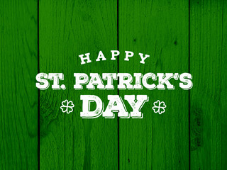 Happy St. Patrick's Day Text Over Green Wood Texture Background