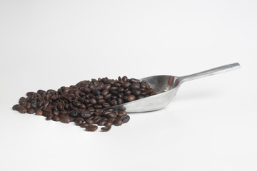 coffee beans  on white background isolated and scoop