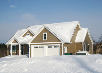 Close up on residential house after snow in winter