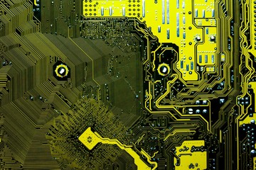 yellow circuit board background of computer motherboard