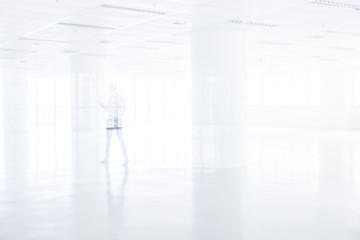 businessman walking in the new office.