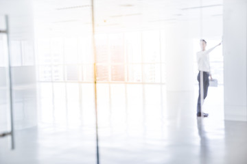 businessman pointing in the new modern office.