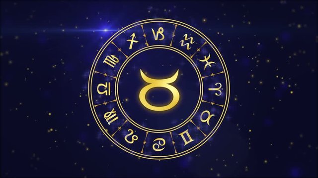 Zodiac sign Taurus and horoscope wheel on the dark blue background