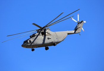 Fototapeta na wymiar Transport helicopter in blue sky