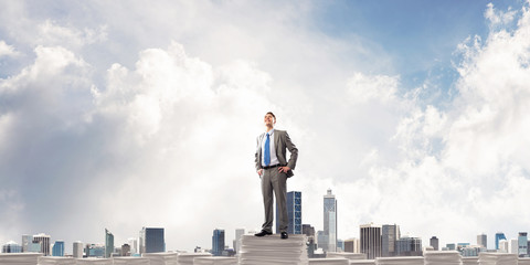 Successful confident businessman in suit.