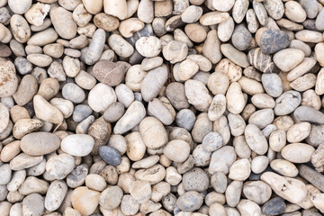 Stone pebbles texture or stone pebbles background. stone pebbles for interior exterior decoration and industrial construction concept design. stone pebbles motifs that occurs natural.