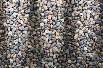 Stone pebbles texture or stone pebbles background. stone pebbles for interior exterior decoration and industrial construction concept design. stone pebbles motifs that occurs natural.