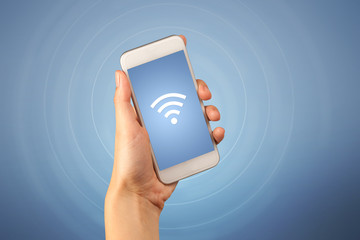 Female hand holding smartphone