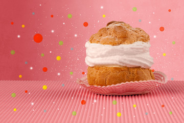 Sweet tasty cakes with colorful background and bokeh light