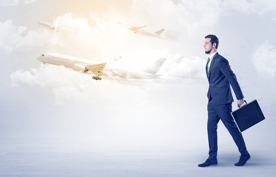 Businessman going somewhere with airplane