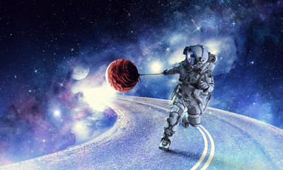 Fantasy image with spaceman catch planet. Mixed media