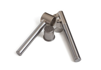 Garlic press on a white background