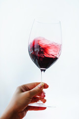 red wine in the hand
