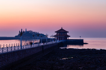 Fototapeta na wymiar Zhanqiao pier at sunrise, Qingdao, Shandong, China