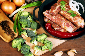Raw pork ribs and spices