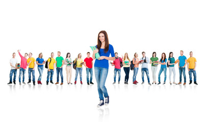 Large group of teenage students isolated on white background. Many different people standing together. School, education, college, university concept.