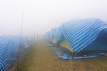 Travel tent in the morning with fog