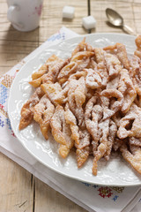Angel wings biscuits, a traditional European sweet dish for carnival. Rustic style.