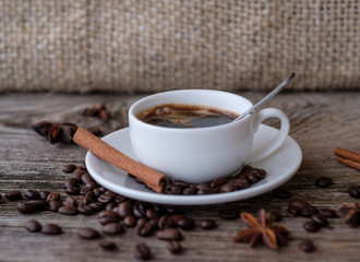 black coffee with white Cup on wooden table