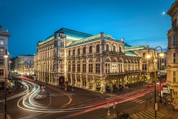 Gordijnen Famous State Opera in Vienna Austria at night © Tryfonov