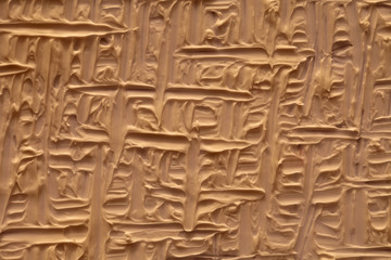 The texture of the paint is brown with a pattern of strips and patterns drawn by a brush, hand made. Fashionable color 2018 - Emperador.