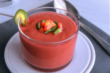 Close up of Gazpacho, tomato soup made from made of raw blended vegetables. Traditional Spanish...