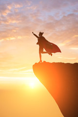 super business woman on mountain