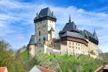 Fototapeta na wymiar medieval gothic royal castle with ramparts Karlstejn near Prague, Central Bohemia region, Czech republic. National cultural landmark.