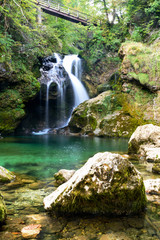 Fototapeta na wymiar Waterfall in Vintgar gorge (Blejski vintgar), Bled, Slovenia