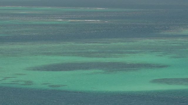 Turquoise colour of Caribbean sea and coral reefs near Mayreau island, St Vincent and the Grenadines