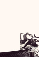 DJ headshell on spinning record