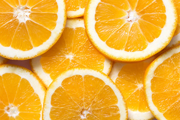 Fresh, juicy slices of orange. Orange fruit background 