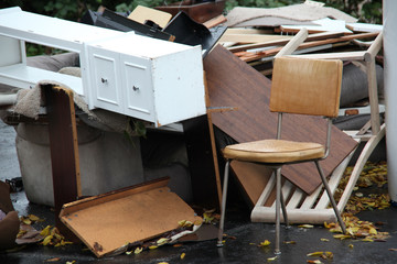 Recycled  furniture ready to be picked up outside.