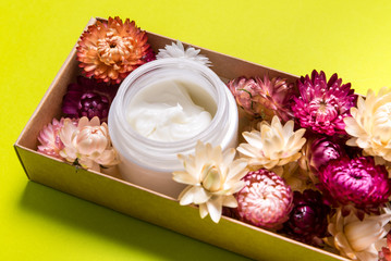 Cosmecic cream on pink background