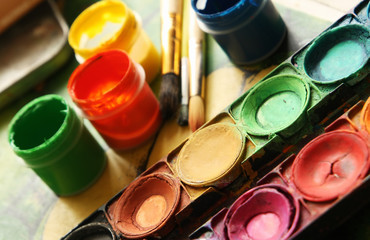 Set of color paints with brushes